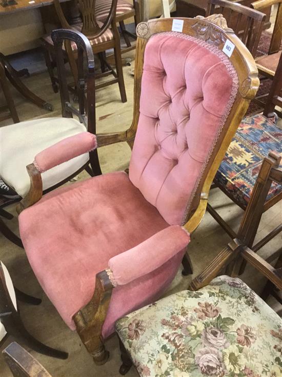 Late Victorian walnut pink dralon upholstered buttonback armchair(-)